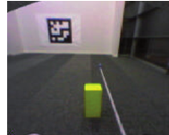 3 Measuring estimation errors. The block was put at 500, 1000 and 1500 mm distance from the robot. Each time the vision system estimates the features (width, height, x and y) of the block. The graph to the right shows the root-mean-square-error (RMS) for each measurement. The x feature ( x -axes runs towards the front) is most heavily affected by increasing distance. 